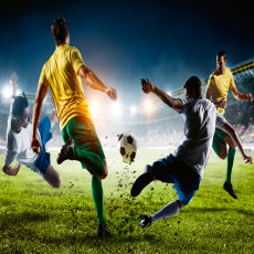 Papier peint mural « Joueurs de football dans un stade » pour le salon